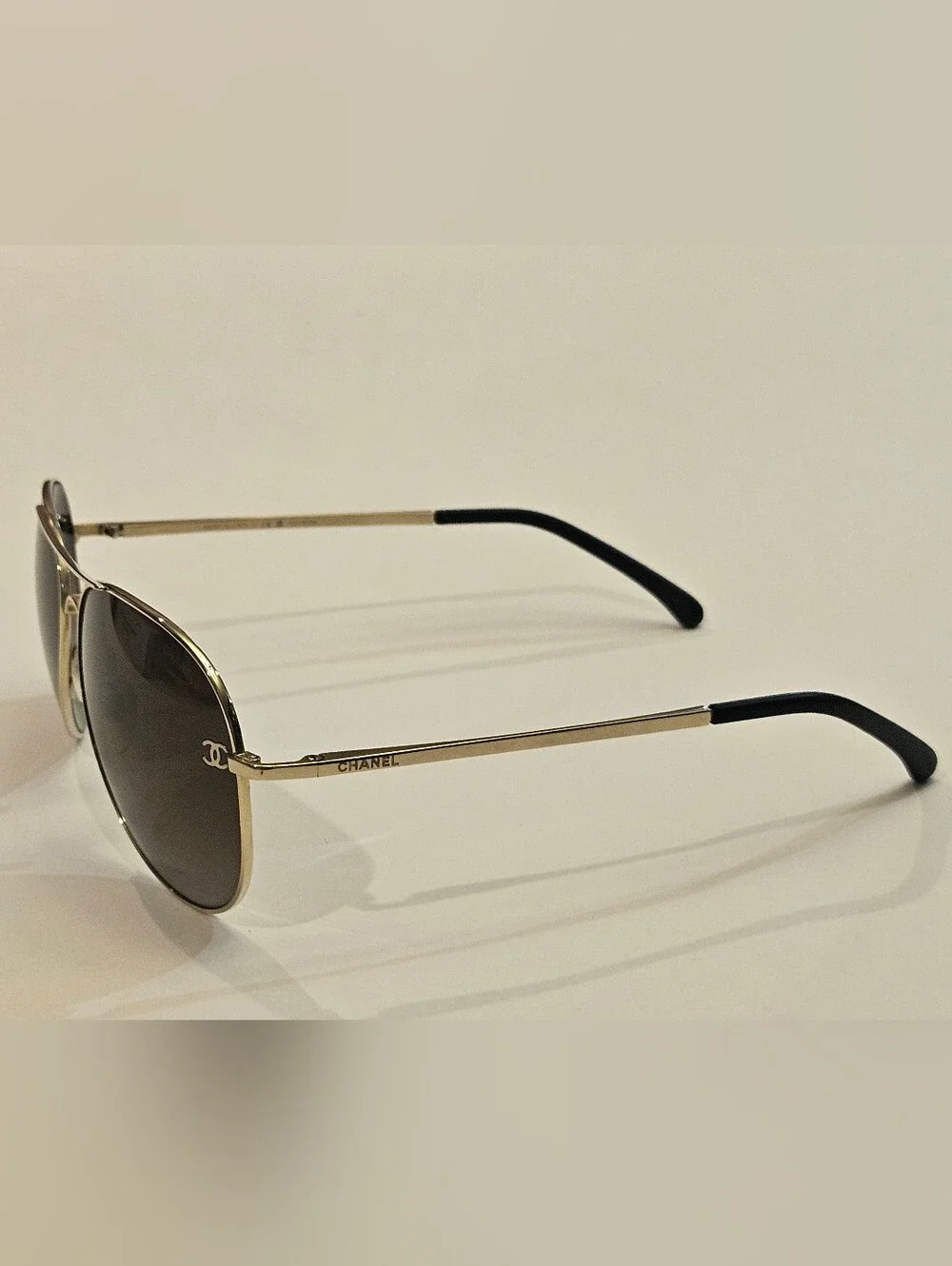 Chanel 4189-T-Q Titanium Polarized Aviator Sunglasses GoldThese are authentic